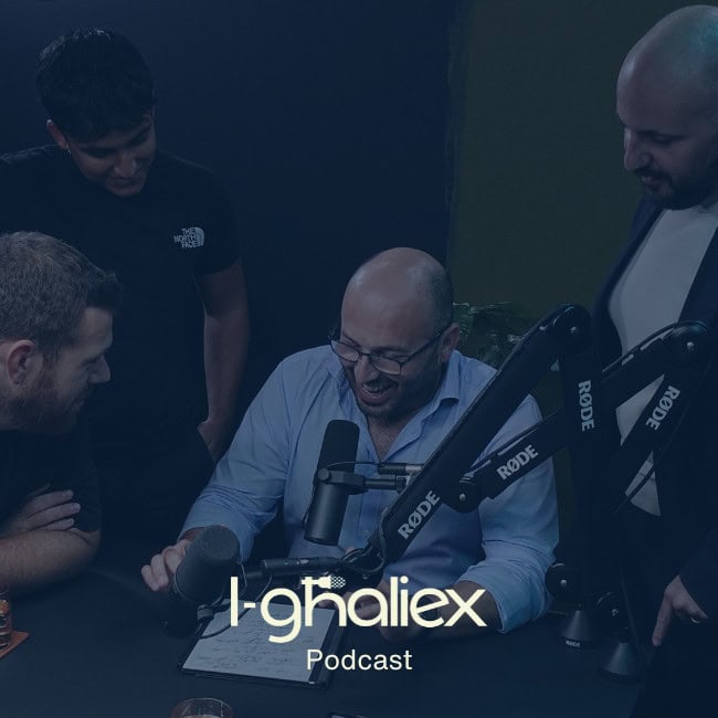 Focused male podcast host engaging with guests during recording session in professional studio environment emphasizing communication and connection.