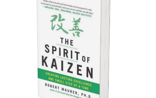 A hardcover book titled "The Spirit of Kaizen" by Robert Maurer, Ph.D., emphasizing creating lasting excellence through small, continuous improvements.