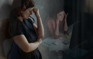 Feeling overwhelmed or stressed; two women experiencing emotional distress, one sitting with head down and the other holding her head in frustration at a desk.